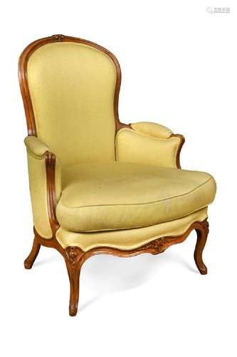 A Louis XV beech frame bergere armchair by Louis Delanois (1...