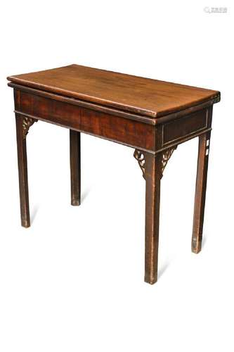 A George III mahogany fold over tea table,