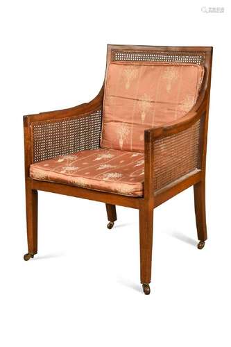 A Regency style bergère chair, circa 1900,