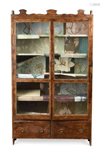 A stained pine two-door glazed cabinet, early 20th century,