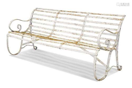 A white painted wrought iron garden bench, late 19th century...