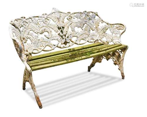 A Coalbrookdale style white painted cast iron garden bench, ...