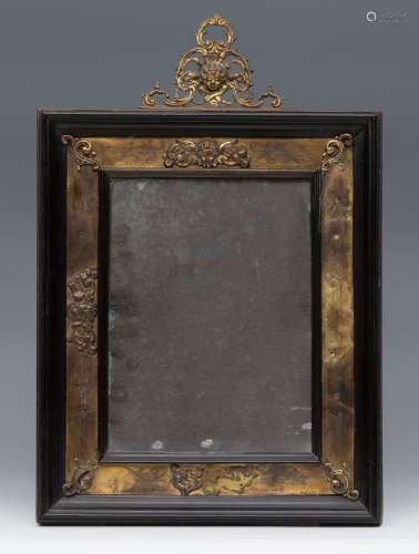 Baroque mirror, late 17th century Italian work.Ebony and gil...