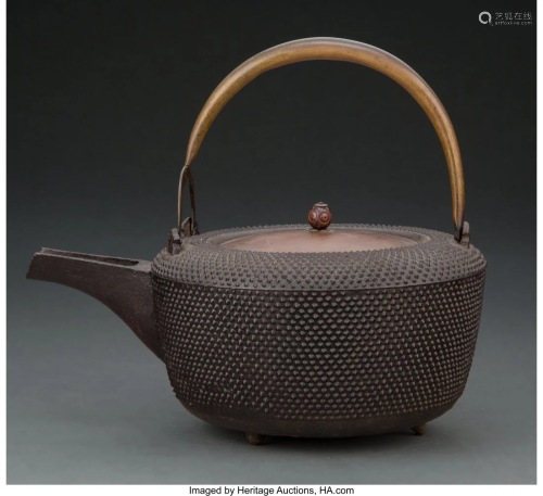 A Japanese Cast Iron Teapot 8-1/2 x 9-1/2 x 7 in