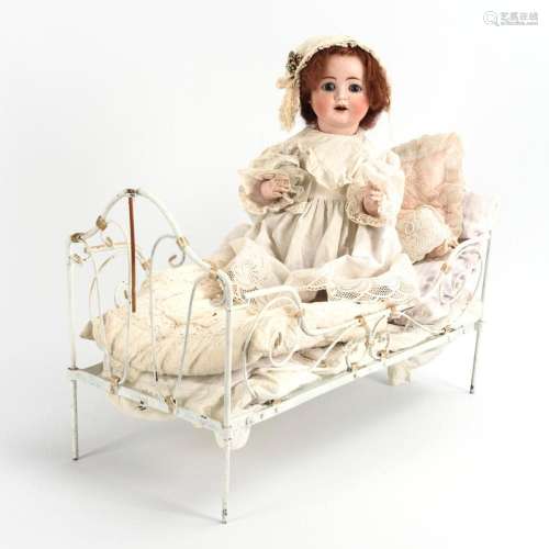 CHARACTER BABY WITH BED. F. & W. GOEBEL.