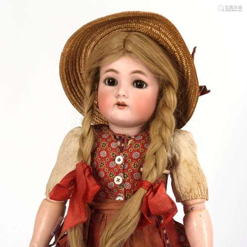 ORIGINAL DRESSED GIRL DOLL WITH BRAIDS. KÄMMER & REINHAR...