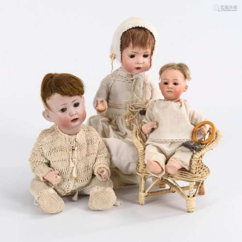 3 SMALL BABY DOLLS + CHAIR.