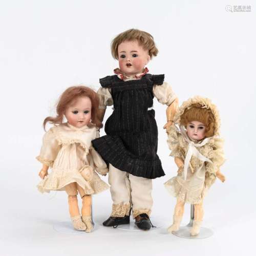 3 SMALL DOLLS.