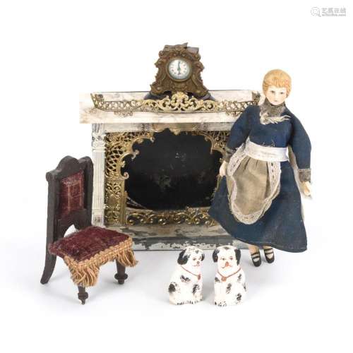 FIREPLACE, DOLLS AND SOME ACCESSORIES FOR THE DOLLHOUSE.