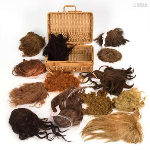 CONVOLUTE DOLL WIGS IN BASKET CASE.