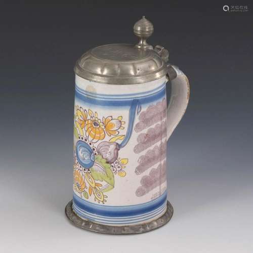 BAROQUE FAIENCE ROLLER JUG WITH FLORAL PAINTING. BAYREUTH.