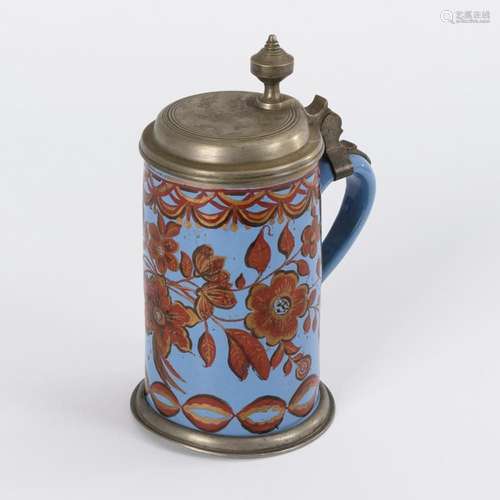 BLUE FAIENCE ROLLER JUG WITH FLOWERS. SCHREZHEIM.