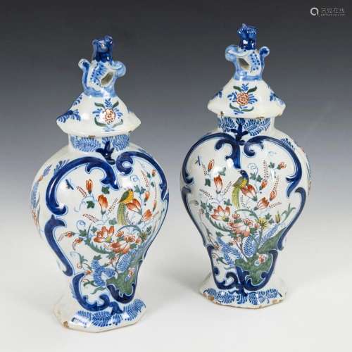 PAIR OF BAROQUE FAIENCE LIDDED VASES WITH BIRD AND FLOWER PA...