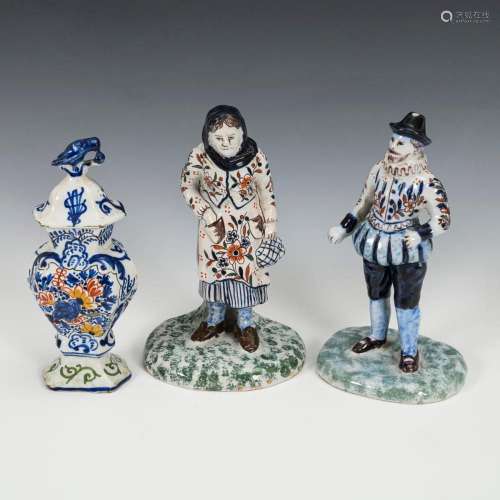 2 BAROQUE FAIENCE FIGURES AND 1 SMALL DELFT FAIENCE LIDDED V...