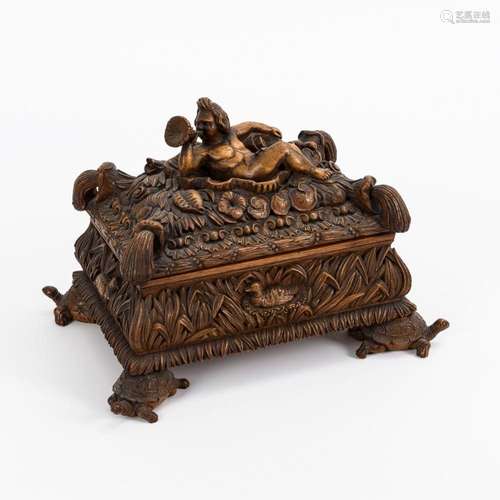 ELABORATELY CARVED CASKET.