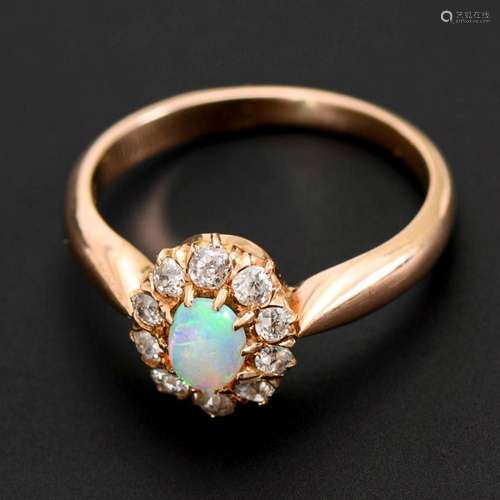 ART NOUVEAU RING WITH OPAL AND OLD CUT DIAMONDS.