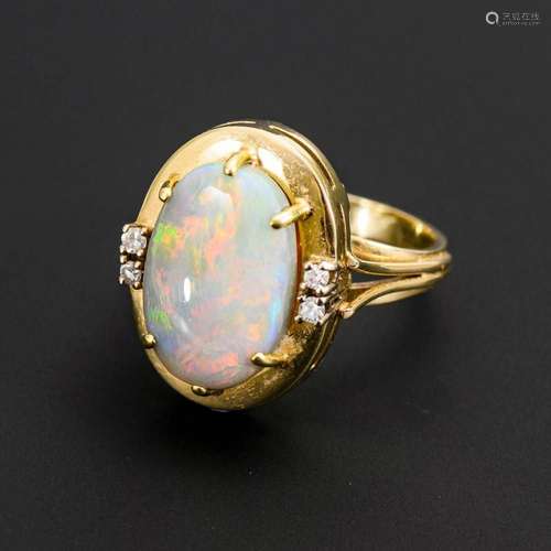 RING WITH WHITE OPAL AND DIAMONDS.