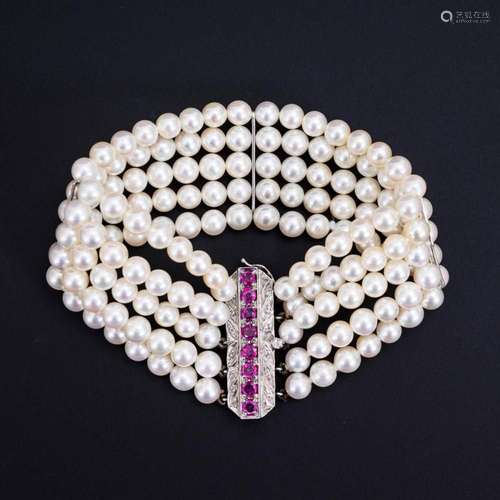 5 ROW CULTURED PEARL BRACELET WITH RUBIES.