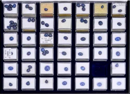 SET OF UNMOUNTED SAPPHIRES IN A CASE.