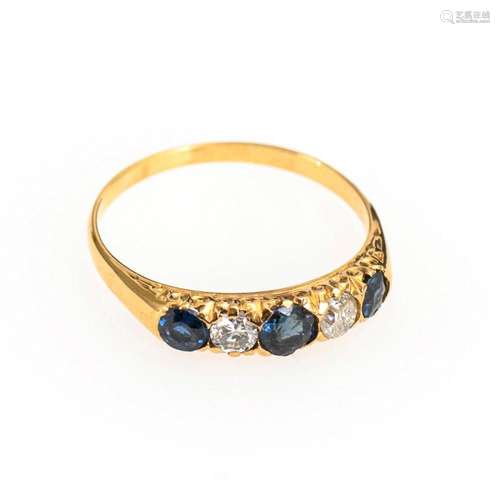 RING WITH SAPPHIRES AND OLD CUT DIAMONDS, AROUND 1900.