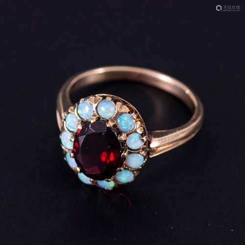 OPAL GARNET RING.