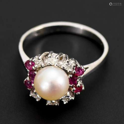 RING WITH CULTURED PEARL, RUBIES AND DIAMONDS.