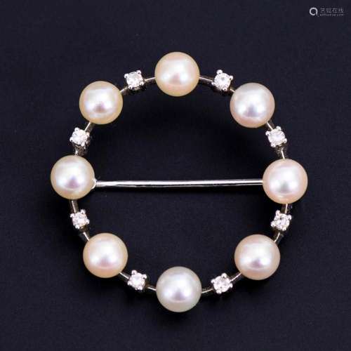 RING BROOCH WITH CULTURED PEARLS AND DIAMONDS.