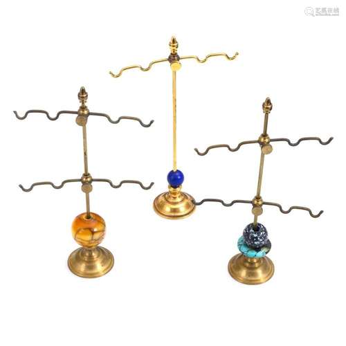 3 JEWELRY STANDS WITH DIFFERENT DECORATIVE PARTS.