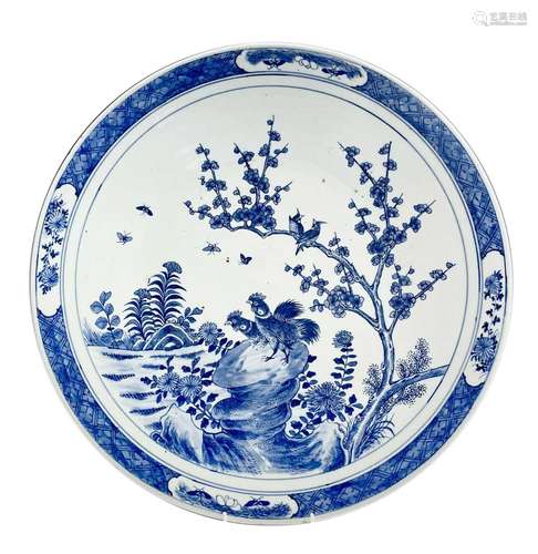 A Chinese blue and white porcelain charger, 19th century, wi...