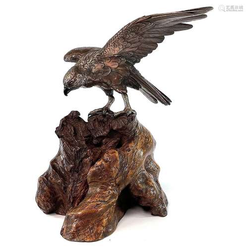 A Japanese silvered bronze Okimono of a hawk by Seiya Genryu...