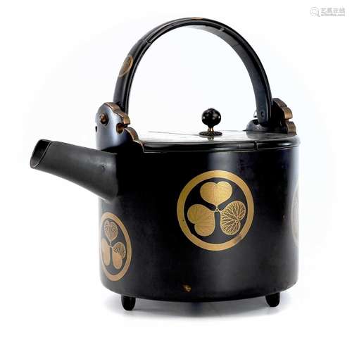 A Japanese lacquer saki kettle, Meiji Period, with swing han...