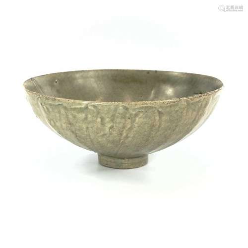 A Chinese celadon bowl, Song Dynasty, of fluted conical form...