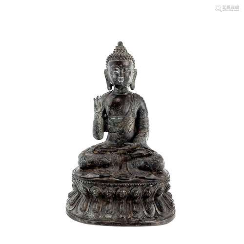 A Chinese bronze model of a seated buddha, 20th century, six...