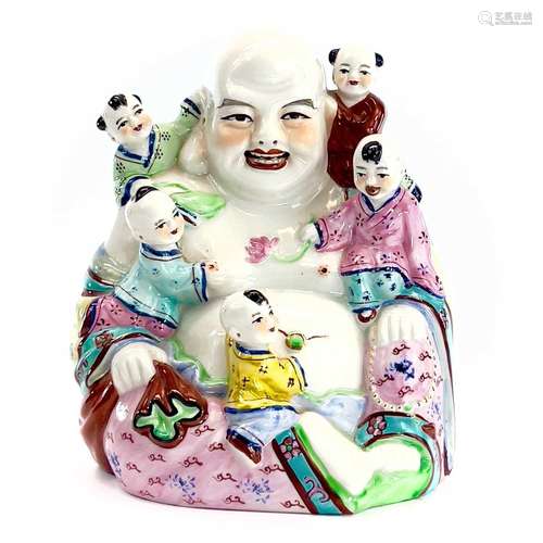 A Chinese famille rose porcelain figure of Buddha with five ...