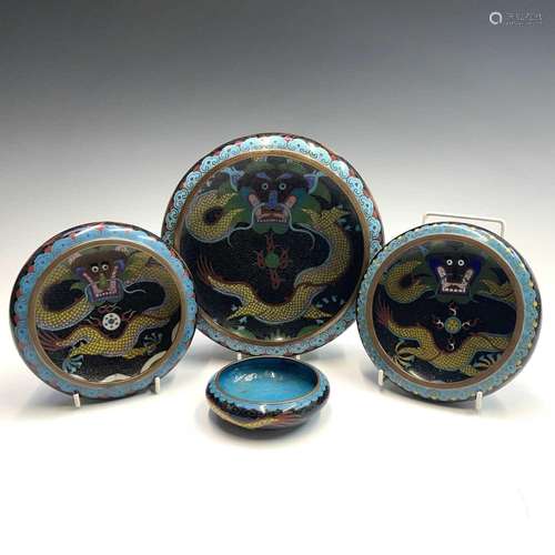 Four Chinese cloisonne shallow bowls, circa 1900, each decor...