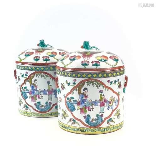 A near pair of Chinese famille rose porcelain cylindrical ja...