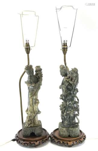 A pair of Chinese green hardstone figures of Guanyin mounted...