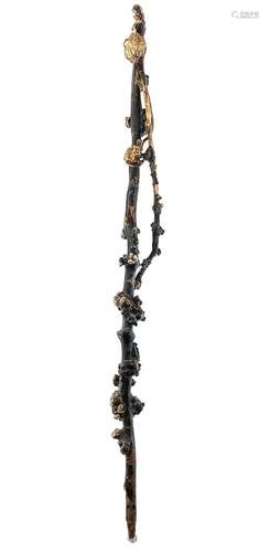 A Chinese carved rootwood walking stick, Qing Dynasty, with ...