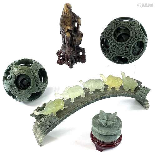 Two Chinese green hardstone puzzle balls, diameter 11.5cm, a...