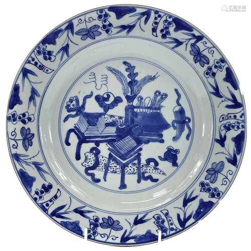 A Chinese porcelain blue and white dish, 18th century, decor...