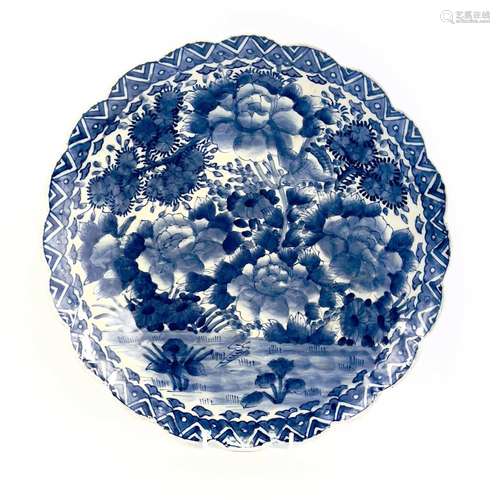 A Japanese blue and white porcelain charger, late 19th centu...