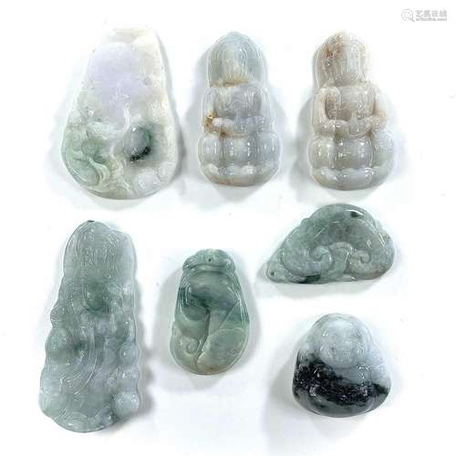 Seven Chinese jade pendants and carvings, largest 7 x 3.5cm....