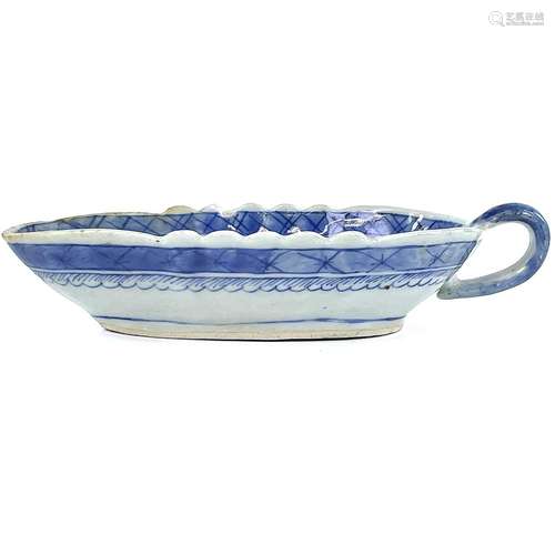 A Chinese blue and white sauce boat, 18th century, the inter...