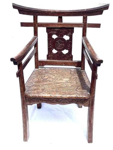 A Chinese carved wood armchair, 19th century, the seat carve...