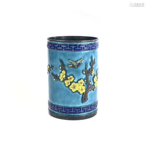 A Chinese silver and enamel brush pot, decorated in relief w...