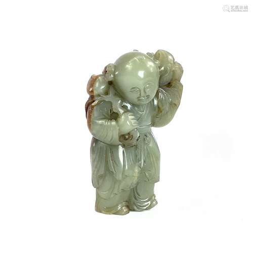 A Chinese carved jade figure of a boy, height 10cm, width 6....