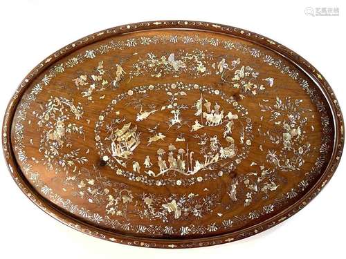 A Chinese rosewood and mother of pearl inlaid oval tray, 19t...