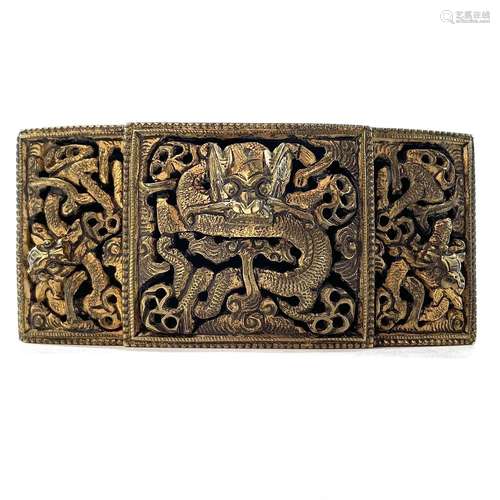 A Chinese brass buckle, circa 1900, with pierced dragon deco...