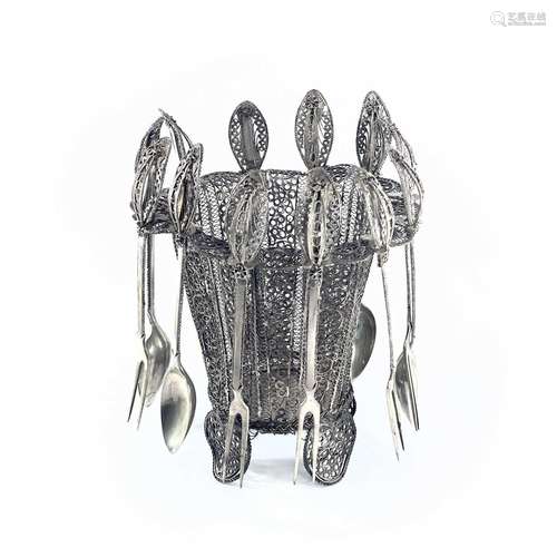 An Indian silver filigree basket, of tapering form, with fla...