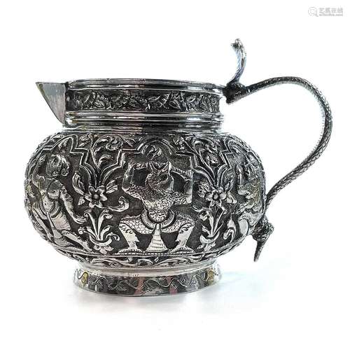 An Indian Madras silver jug, circa 1900, the handle in the f...